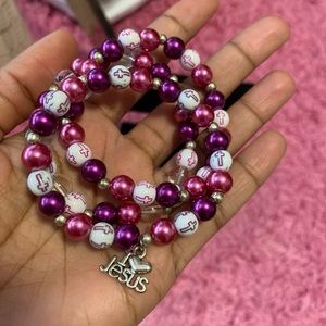 Pink and Purple Beaded Cross Bracelets